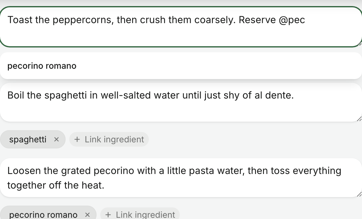 The @ mention autocomplete, with chips beneath the step